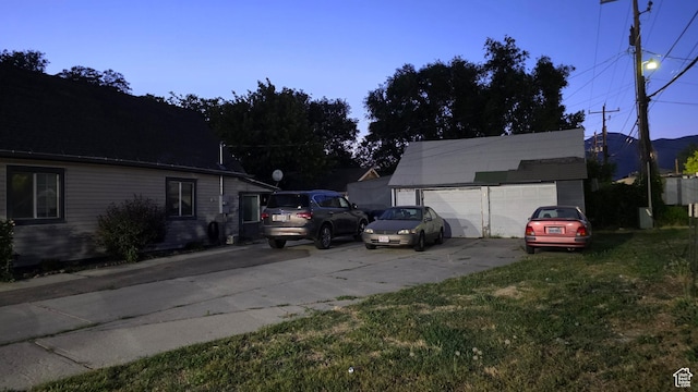 358 E 11th St, Ogden, UT 84404 - exterior space with a detached garage