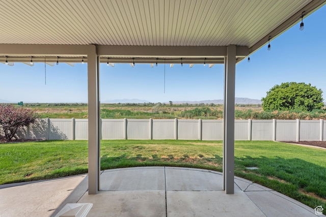 3535 W Overlook Dr, Layton, UT 84041 - fenced backyard featuring a patio and a mountain view