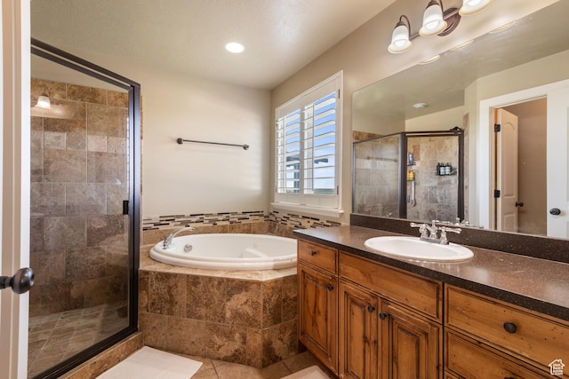 3535 W Overlook Dr, Layton, UT 84041 - bathroom with a bath, a shower stall, vanity, and tile patterned floors