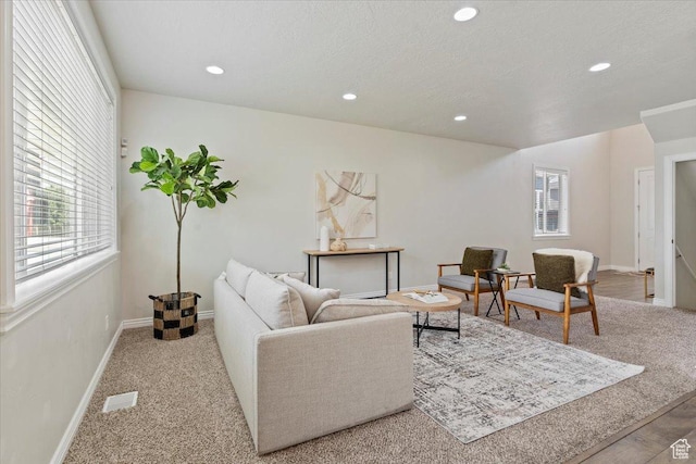 9714 S Oia Ln W, South Jordan, UT 84095 - carpeted living room with healthy amount of natural light and recessed lighting