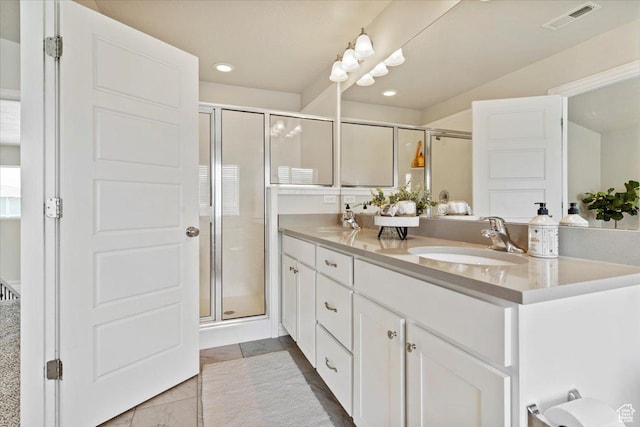 9714 S Oia Ln W, South Jordan, UT 84095 - bathroom with double vanity, a shower stall, recessed lighting, and tile patterned flooring