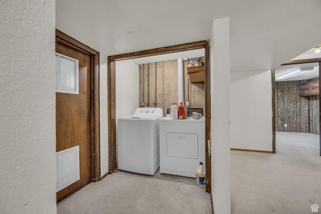 1731 E 1460 N, Logan, UT 84341 - washroom featuring washer and clothes dryer, carpet floors, and wooden walls