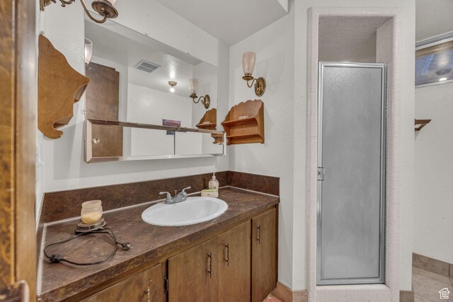 1731 E 1460 N, Logan, UT 84341 - bathroom featuring vanity and a stall shower