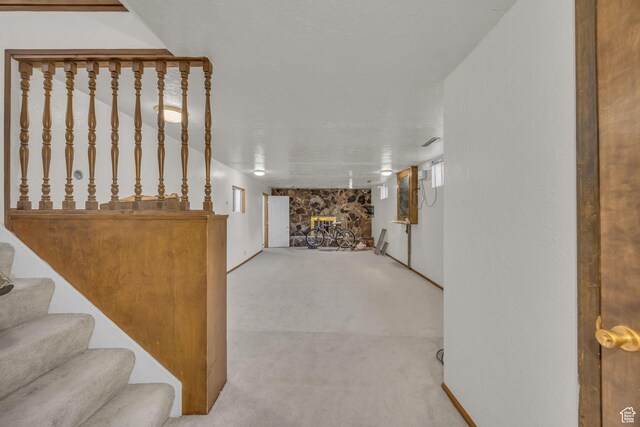 1731 E 1460 N, Logan, UT 84341 - unfurnished living room with carpet and stairs