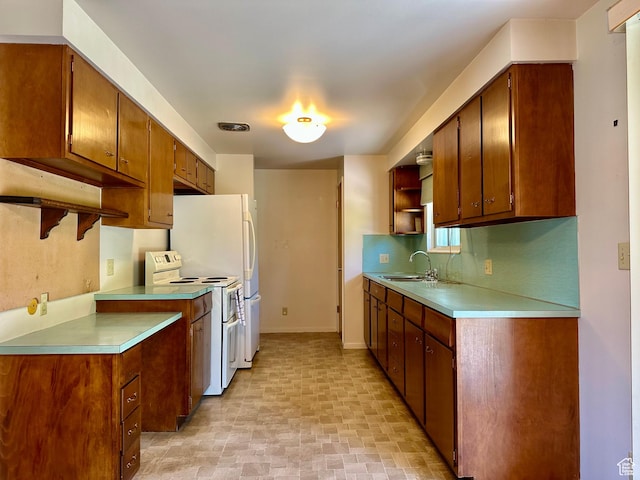 372 E 800 N, Logan, UT 84321 - kitchen with electric range, open shelves, light countertops, and backsplash