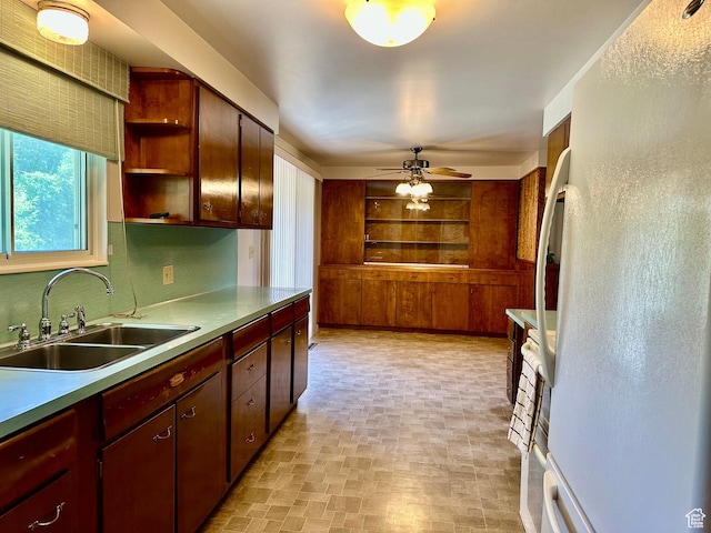 372 E 800 N, Logan, UT 84321 - kitchen with freestanding refrigerator, ceiling fan, open shelves, and brick patterned flooring