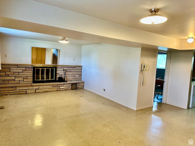 372 E 800 N, Logan, UT 84321 - unfurnished living room featuring a stone fireplace and baseboards