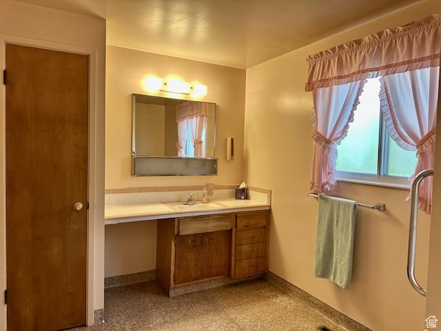 372 E 800 N, Logan, UT 84321 - bathroom with vanity and baseboards