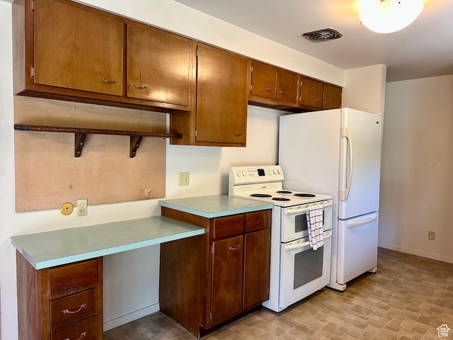 372 E 800 N, Logan, UT 84321 - kitchen featuring white appliances and light countertops