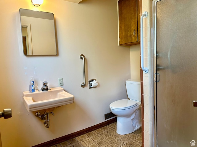 372 E 800 N, Logan, UT 84321 - full bathroom featuring toilet and a stall shower