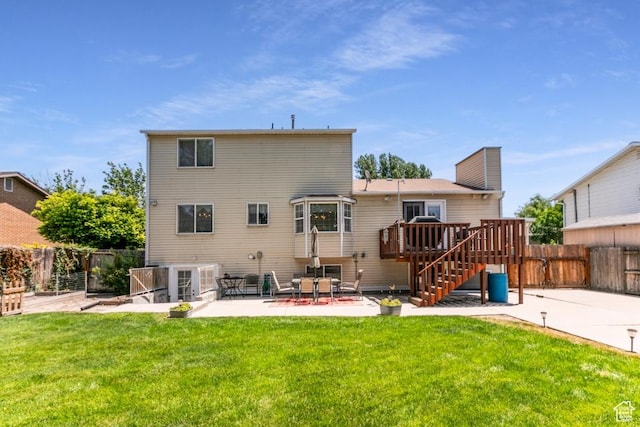 5668 S 1090 W, Murray, UT 84123 - rear view of house featuring a patio, a fenced backyard, stairway, a deck, and a chimney