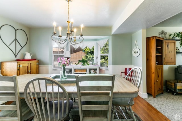 5668 S 1090 W, Murray, UT 84123 - dining area with wainscoting, a chandelier, and wood finished floors