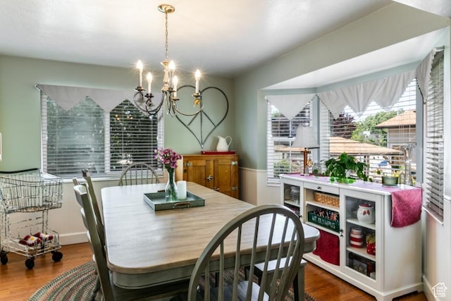 5668 S 1090 W, Murray, UT 84123 - dining area with a chandelier, wood finished floors, and wainscoting