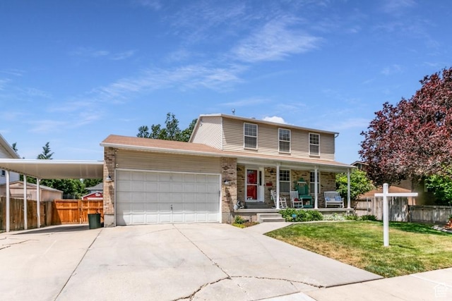 5668 S 1090 W, Murray, UT 84123 - traditional-style house with driveway, a porch, an attached garage, and brick siding
