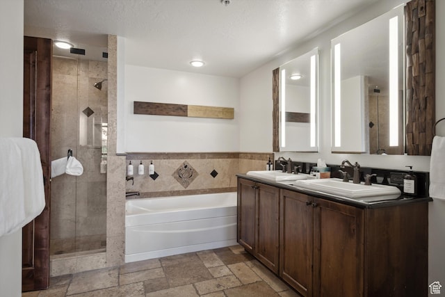 3558 Escala Ct Unit 252, Park City, UT 84098 - bathroom with a stall shower, stone tile flooring, a garden tub, and double vanity