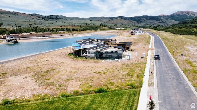 6615 N Lakeside Dr, Mountain Green, UT 84050 - aerial view of property and surrounding area featuring a water and mountain view