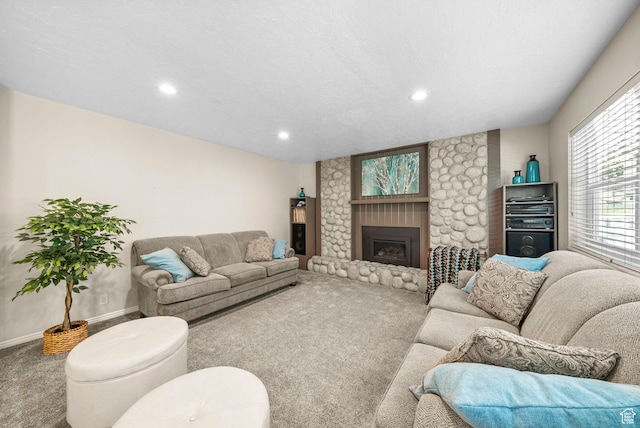 1700 N Bluebird Rd, Orem, UT 84097 - living area featuring carpet flooring, a large fireplace, and recessed lighting