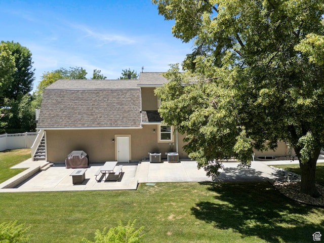 1700 N Bluebird Rd, Orem, UT 84097 - back of house featuring stucco siding, roof with shingles, a patio area, and stairs