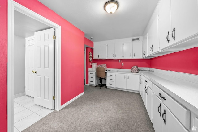 1700 N Bluebird Rd, Orem, UT 84097 - office featuring built in study area, light carpet, and light tile patterned floors