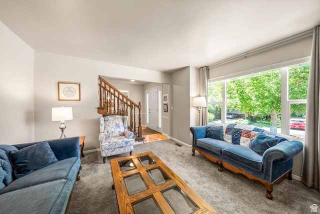 1700 N Bluebird Rd, Orem, UT 84097 - living room featuring stairway and carpet flooring