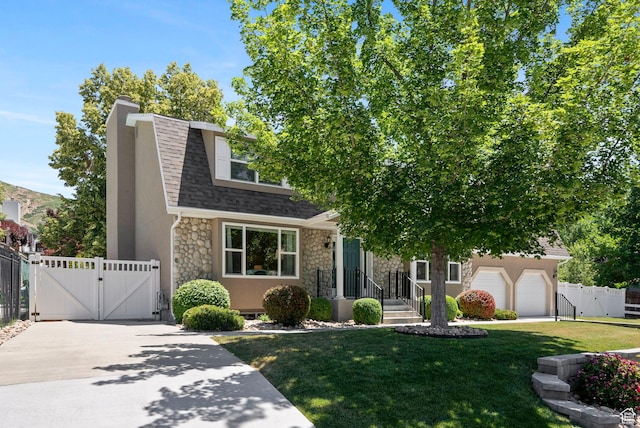 1700 N Bluebird Rd, Orem, UT 84097 - view of front of property with stone siding, a gate, a shingled roof, a chimney, and stucco siding