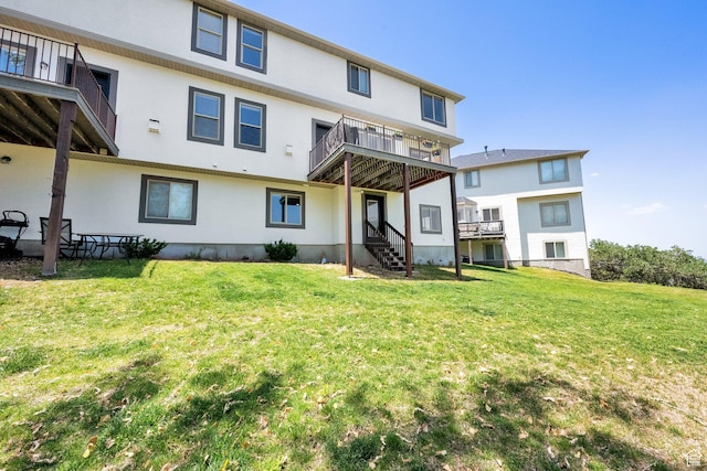 923 E Absaroka Ct S, Draper, UT 84020 - back of house with stucco siding, a yard, and a balcony