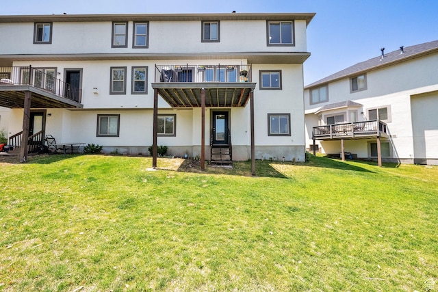 923 E Absaroka Ct S, Draper, UT 84020 - back of property with stucco siding, a yard, and a balcony