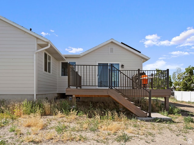 214 S 900 W, Tooele, UT 84074 - rear view of house featuring a deck and stairs