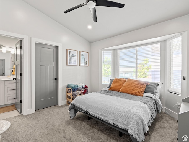 214 S 900 W, Tooele, UT 84074 - bedroom with light colored carpet, vaulted ceiling, ensuite bath, and ceiling fan