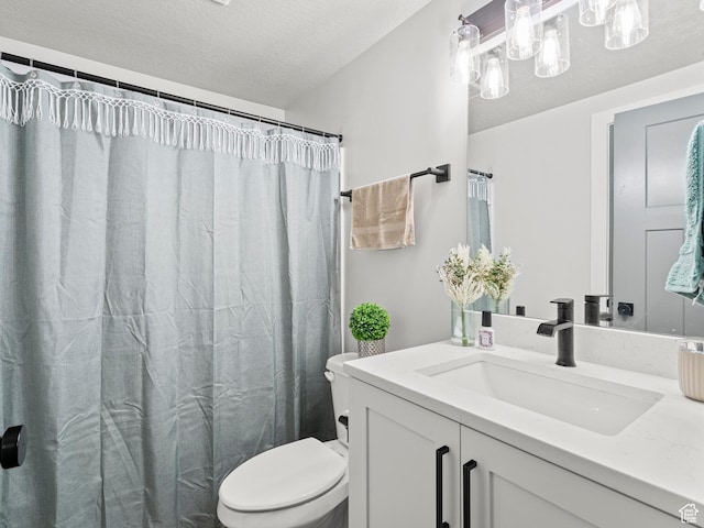 214 S 900 W, Tooele, UT 84074 - bathroom featuring vanity, a textured ceiling, and a shower with curtain