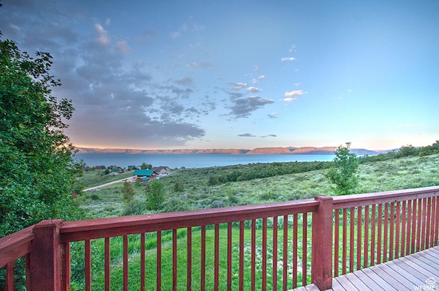1340 N Trapper Loop, Garden City, UT 84028 - deck at dusk with a water view