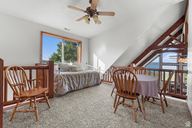 1340 N Trapper Loop, Garden City, UT 84028 - bedroom with carpet floors, vaulted ceiling, and a ceiling fan