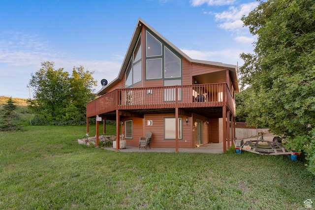1340 N Trapper Loop, Garden City, UT 84028 - back of property with a patio area, a yard, and a deck