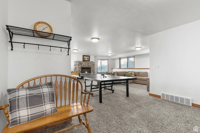 1340 N Trapper Loop, Garden City, UT 84028 - playroom with a stone fireplace and carpet flooring