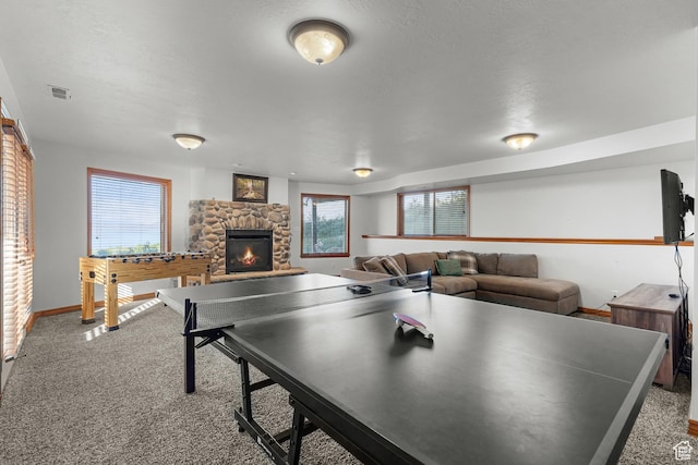 1340 N Trapper Loop, Garden City, UT 84028 - rec room featuring carpet flooring and a stone fireplace