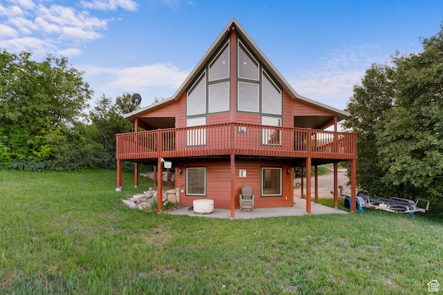 1340 N Trapper Loop, Garden City, UT 84028 - back of property with a patio, a lawn, and a deck