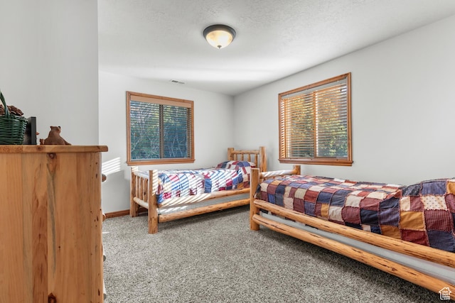 1340 N Trapper Loop, Garden City, UT 84028 - carpeted bedroom featuring baseboards