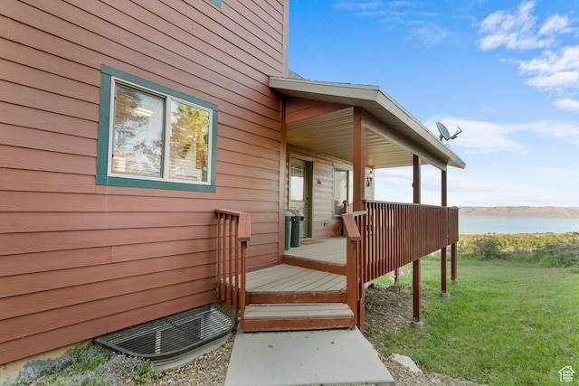 1340 N Trapper Loop, Garden City, UT 84028 - wooden terrace with a water view and a lawn