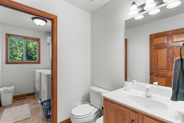 1340 N Trapper Loop, Garden City, UT 84028 - bathroom with washer and clothes dryer, vanity, and tile patterned floors