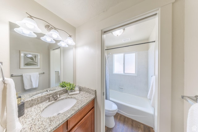 774 W 4375 S, Riverdale, UT 84405 - full bath featuring wood finished floors, vanity, and shower / tub combo with curtain