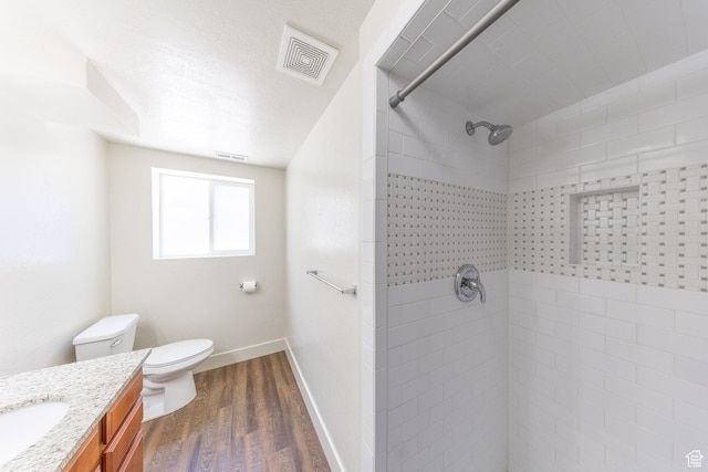 774 W 4375 S, Riverdale, UT 84405 - full bath with wood finished floors, a tile shower, and vanity