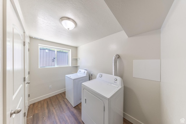 774 W 4375 S, Riverdale, UT 84405 - laundry room featuring washer and clothes dryer, dark wood-type flooring, and a textured ceiling