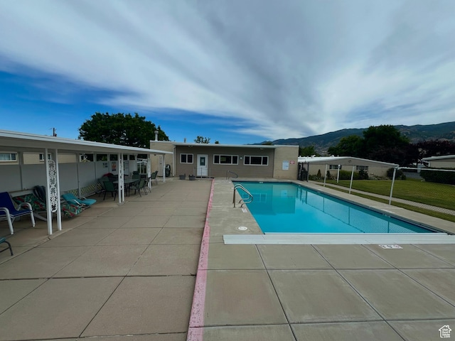 399 W 400 N Unit 47, Bountiful, UT 84010 - view of pool featuring a patio area and a mountain view