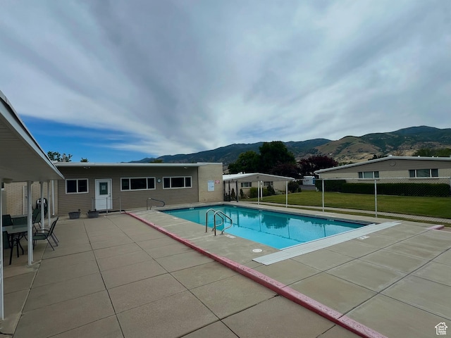 399 W 400 N Unit 47, Bountiful, UT 84010 - view of pool featuring a mountain view and a patio area