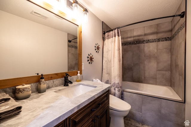4311 N Diamond Ln, Erda, UT 84074 - bathroom with vanity and tiled shower / bath combo