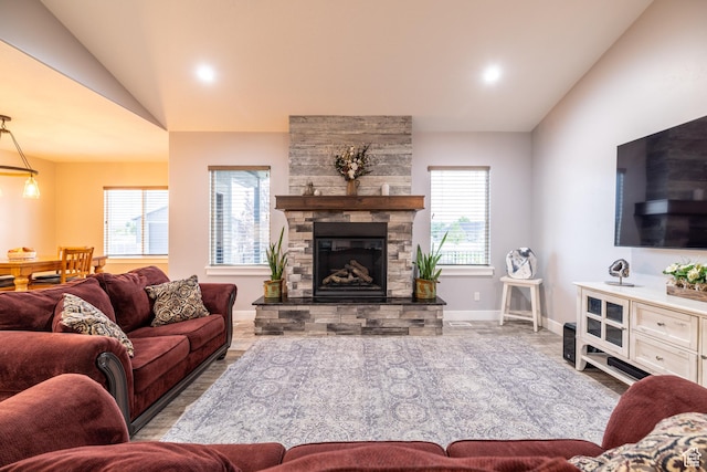 4311 N Diamond Ln, Erda, UT 84074 - living room with lofted ceiling, a fireplace, and recessed lighting
