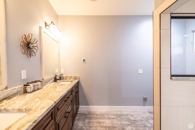 4311 N Diamond Ln, Erda, UT 84074 - full bathroom featuring double vanity and wood finished floors