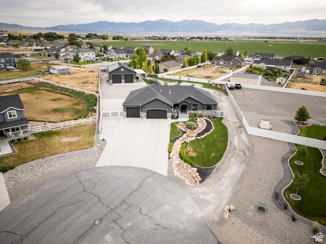4311 N Diamond Ln, Erda, UT 84074 - aerial perspective of suburban area with a mountainous background