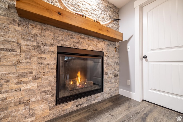 4311 N Diamond Ln, Erda, UT 84074 - detailed view of wood finished floors and a glass covered fireplace