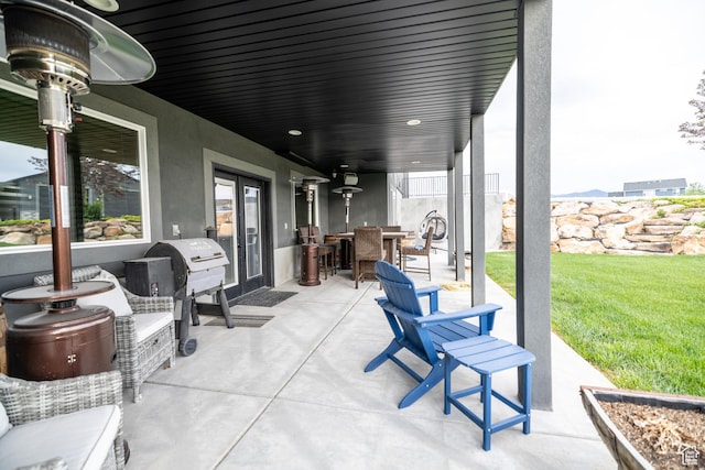 4311 N Diamond Ln, Erda, UT 84074 - view of patio / terrace featuring french doors, outdoor dining space, and grilling area